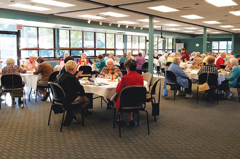 Circular tables with people enjoying a meal