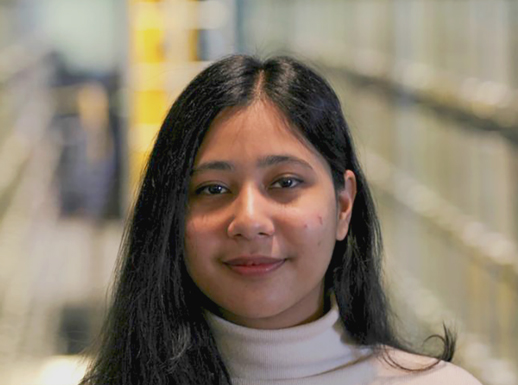 A woman in a library.