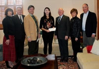 Samantha Adams (middle) pictured with members of the FSSP.