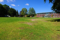 The wide-open grassy southeast lawn